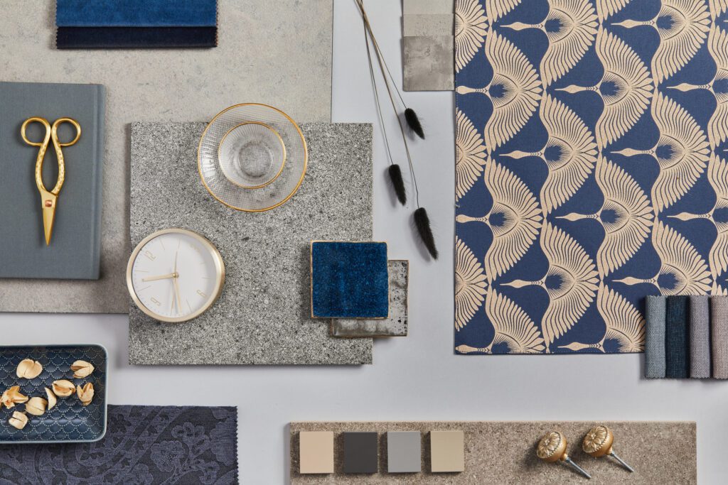 Blue and gold textures and design objects flatlay